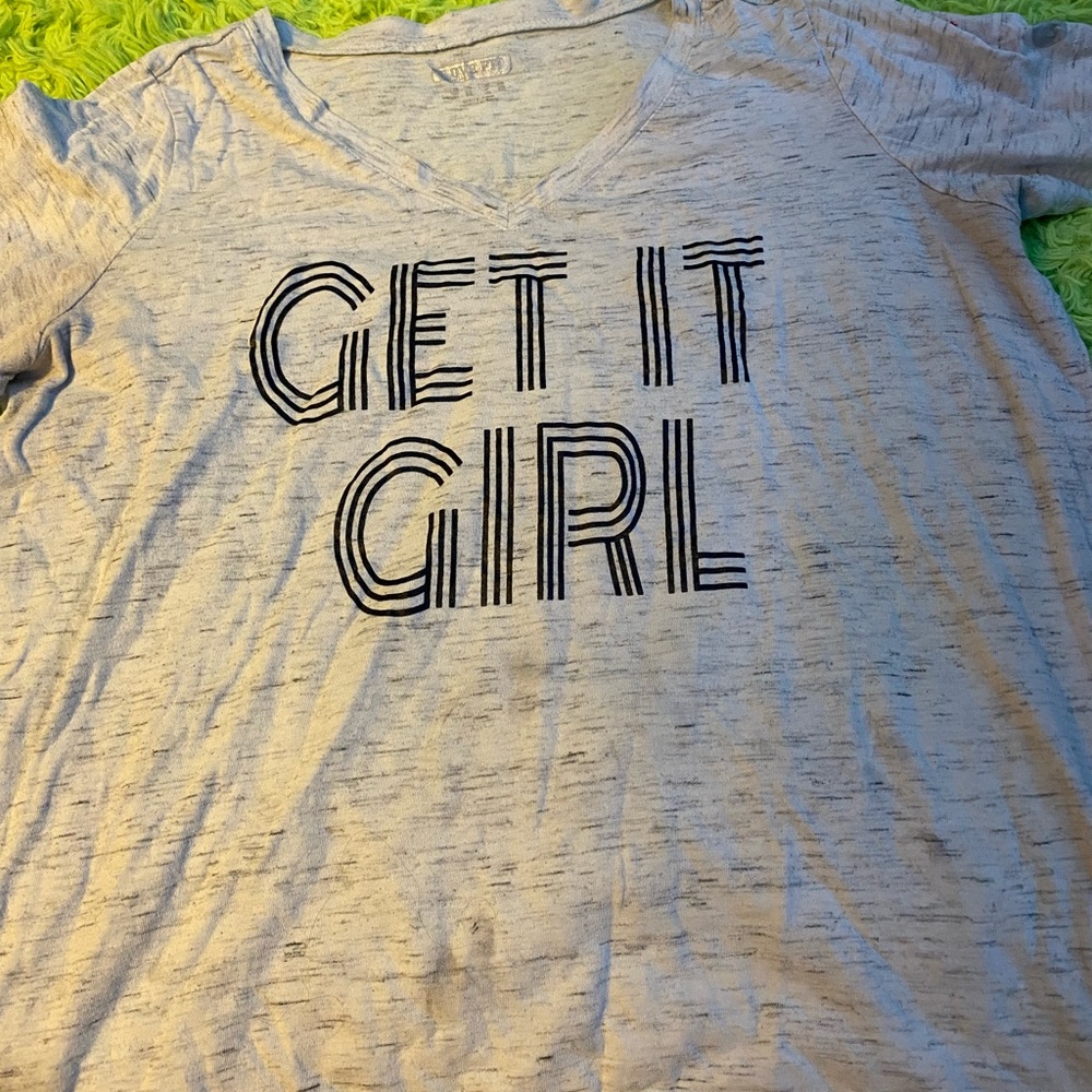 Don’t know the brand or size but it’s either 1X or 2X says “Get It Girl”